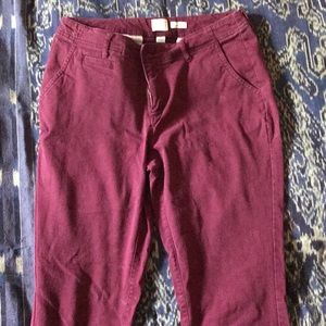 Burgundy slacks.